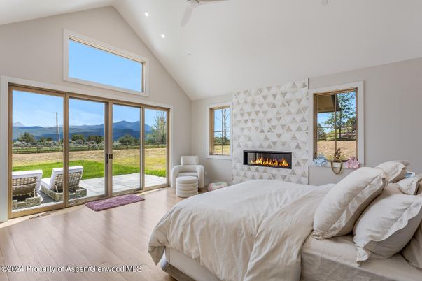 Bedroom, Fireplace, Interior, Recessed Lighting, Wood Texture Flooring