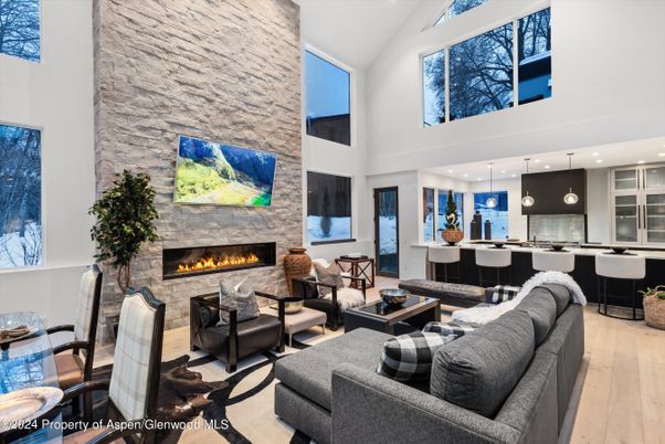 Fireplace, Interior, Kitchen, Living room, Pendant Lights, Recessed Lighting, Stone Walls, Wood Texture Flooring