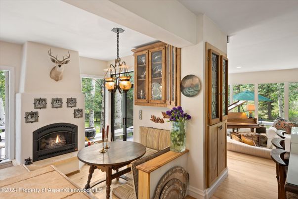 Chandelier, Dining room, Fireplace, Interior, Pendant Lights, Recessed Lighting, Wood Texture Flooring