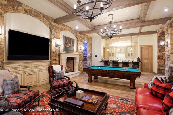 Billiard Table, Chandelier, Fireplace, Game Room, Interior, Recessed Lighting, Stone Walls, Wooden Beams, Wood Texture Flooring