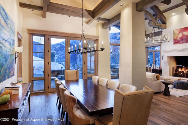 Chandelier, Dining room, Fireplace, Interior, Living room, Pendant Lights, Recessed Lighting, Wooden Beams, Wood Texture Flooring