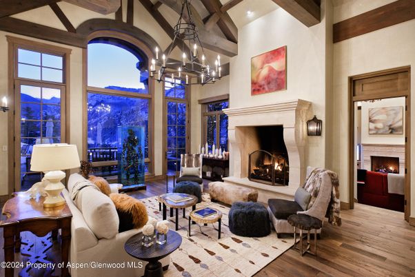 Chandelier, Fireplace, Interior, Living room, Pendant Lights, Recessed Lighting, Wooden Beams, Wood Texture Flooring