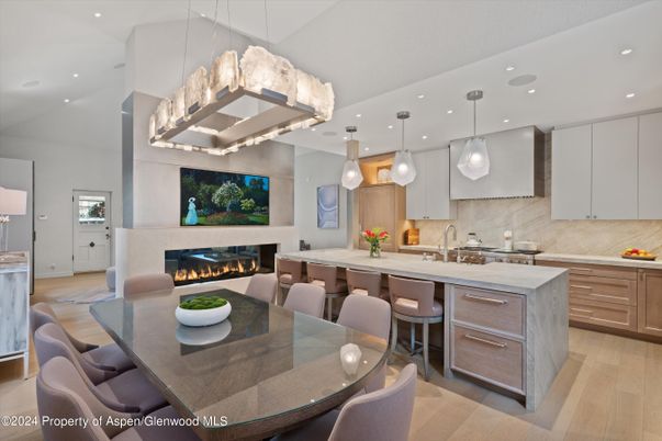 Dining room, Fireplace, Interior, Kitchen, Pendant Lights, Recessed Lighting, Stainless Steel Appliances, Wood Texture Flooring