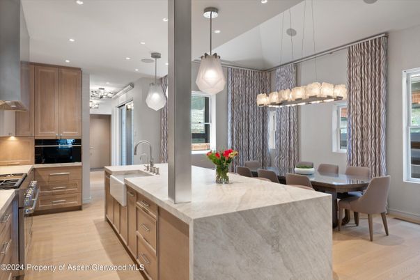 Dining room, Interior, Kitchen, Pendant Lights, Recessed Lighting, Stainless Steel Appliances, Wood Texture Flooring