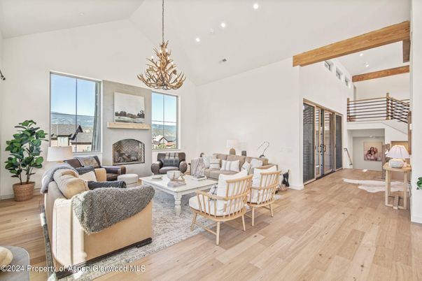 Chandelier, Fireplace, Interior, Living room, Recessed Lighting, Wooden Beams, Wood Texture Flooring