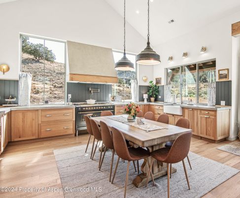 Dining room, Interior, Kitchen, Pendant Lights, Recessed Lighting, Stainless Steel Appliances, Wood Texture Flooring