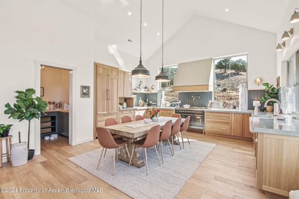 Dining room, Interior, Kitchen, Pendant Lights, Recessed Lighting, Stainless Steel Appliances, Wood Texture Flooring