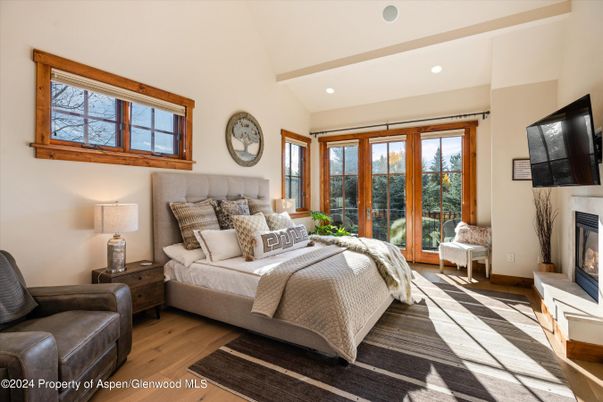 Bedroom, Fireplace, Interior, Recessed Lighting, Wood Texture Flooring