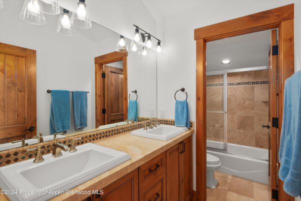 Bathroom, Dual Sink Vanities, Glass Shower, Interior, Tile Countertops