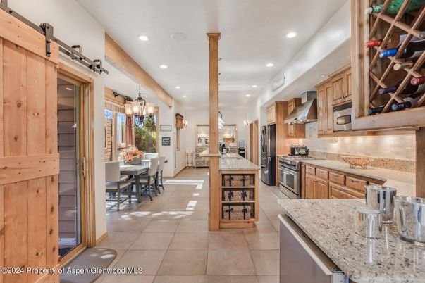 Chandelier, Dining room, Interior, Kitchen, Pendant Lights, Recessed Lighting, Stainless Steel Appliances