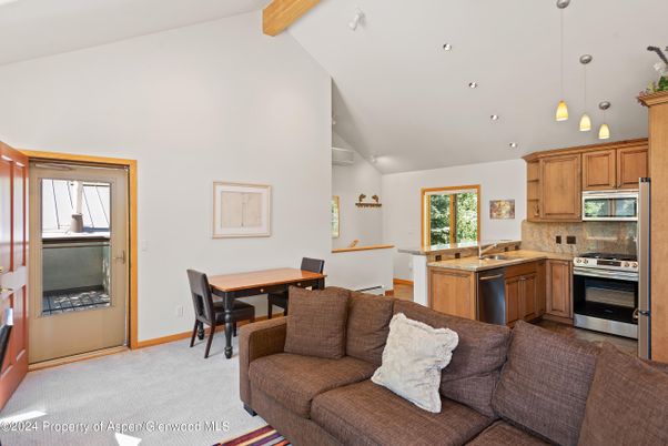 Dining room, Interior, Kitchen, Living room, Pendant Lights, Recessed Lighting, Stainless Steel Appliances, Wooden Beams