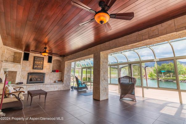 Fireplace, Interior, Stone Walls, Sun Room, Wooden Ceilings