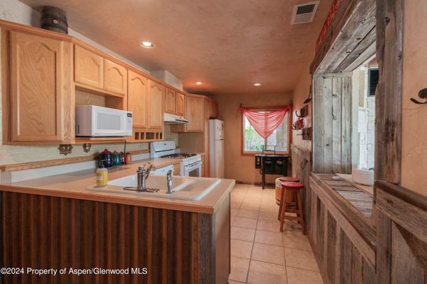 Interior, Kitchen, Recessed Lighting, Tile Countertops