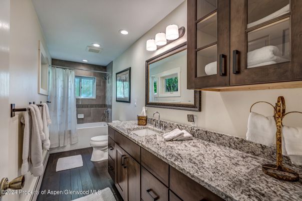 Bathroom, Glass Shower, Interior, Recessed Lighting, Wood Texture Flooring