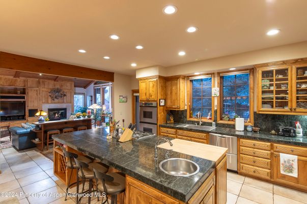 Fireplace, Interior, Kitchen, Living room, Recessed Lighting, Stainless Steel Appliances
