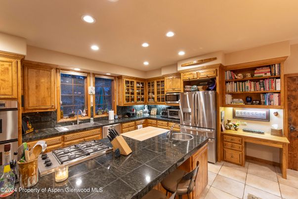 Interior, Kitchen, Recessed Lighting, Stainless Steel Appliances, Tile Countertops
