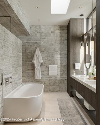 Bathroom, Dual Sink Vanities, Free Standing Baths, Glass Shower, Interior, Marble Walls, Recessed Lighting
