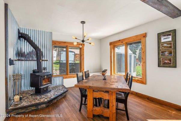 Dining room, Fireplace, Interior, Pendant Lights, Wooden Beams, Wood Texture Flooring