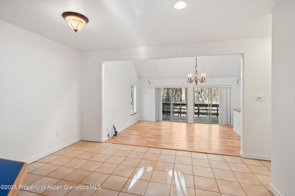 Chandelier, Dining room, Empty room, Interior, Recessed Lighting, Wood Texture Flooring