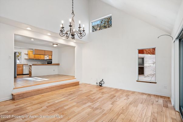 Chandelier, Interior, Kitchen, Recessed Lighting, Stainless Steel Appliances, Wood Texture Flooring