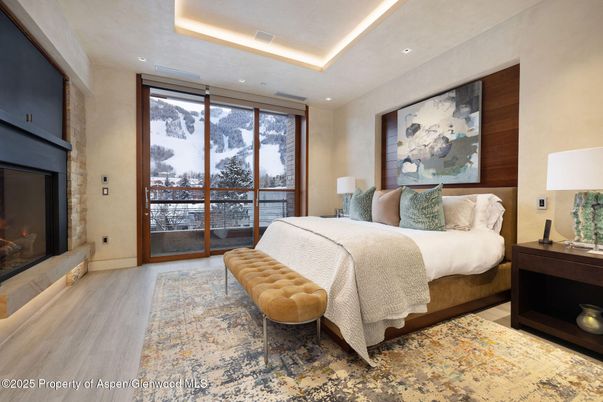 Bedroom, Fireplace, Interior, Recessed Lighting, Wood Texture Flooring