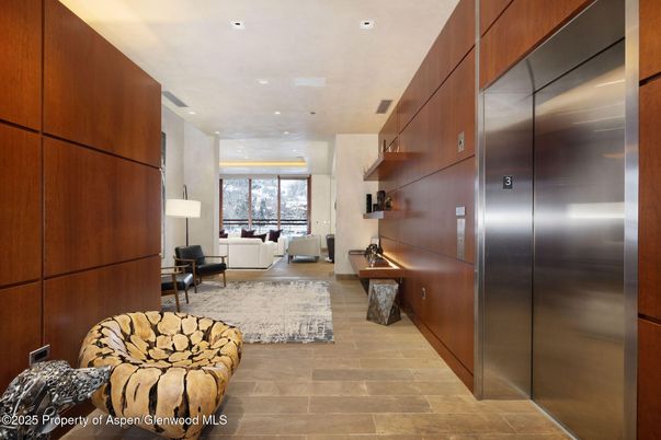 Elevator, Interior, Living room, Recessed Lighting, Wood Texture Flooring, Wooden Walls