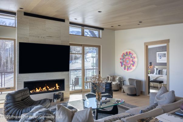 Fireplace, Interior, Living room, Recessed Lighting, Stone Walls, Wooden Ceilings, Wood Texture Flooring