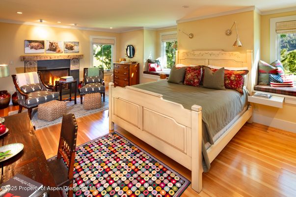 Bedroom, Fireplace, Interior, Pendant Lights, Recessed Lighting, Wood Texture Flooring