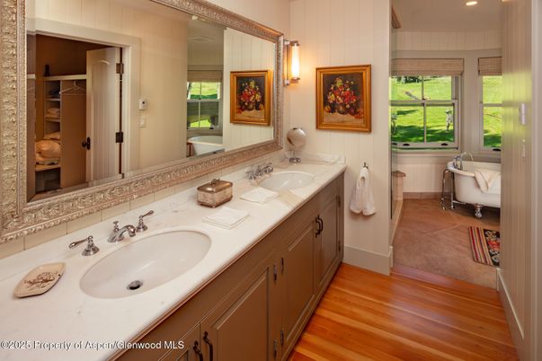 Bathroom, Dual Sink Vanities, Free Standing Baths, Interior, Recessed Lighting, Wood Texture Flooring
