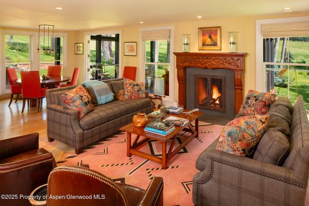 Dining room, Fireplace, Interior, Living room, Pendant Lights, Recessed Lighting, Wood Texture Flooring