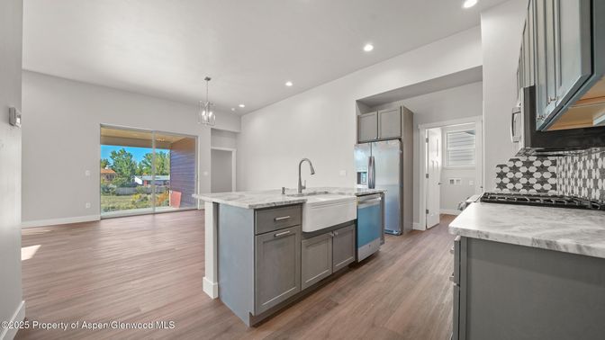 Interior, Kitchen, Pendant Lights, Recessed Lighting, Stainless Steel Appliances, Wood Texture Flooring