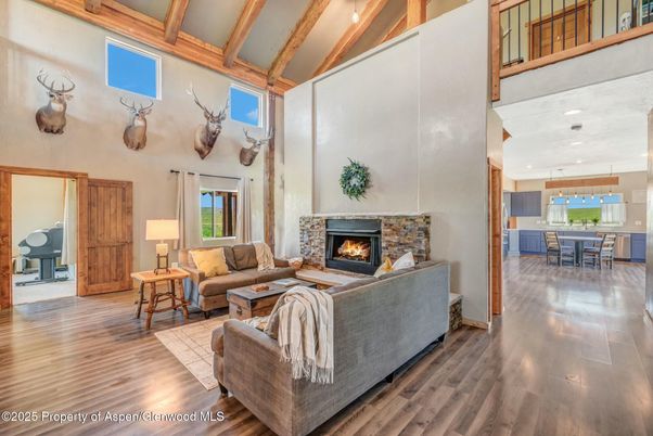 Dining room, Fireplace, Interior, Kitchen, Living room, Pendant Lights, Recessed Lighting, Wooden Beams, Wood Texture Flooring