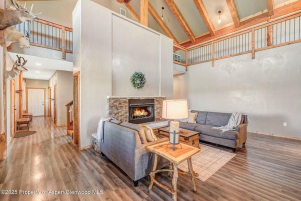 Fireplace, Interior, Living room, Recessed Lighting, Wooden Beams, Wood Texture Flooring