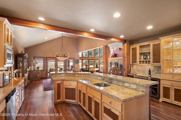Dining room, Fireplace, Interior, Kitchen, Pendant Lights, Recessed Lighting, Wood Texture Flooring
