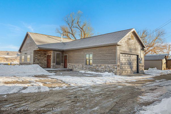 Attached, Exterior, Facade, Brick Facade, Log Home