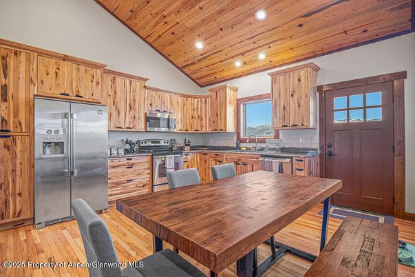 Dining room, Interior, Kitchen, Recessed Lighting, Stainless Steel Appliances, Wooden Ceilings, Wood Texture Flooring