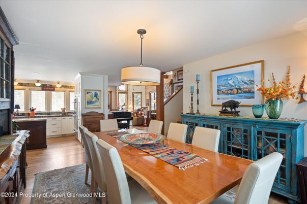 Dining room, Fireplace, Interior, Pendant Lights, Wood Texture Flooring