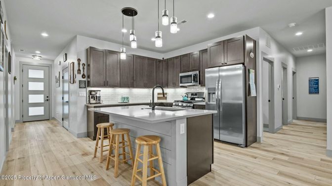 Interior, Kitchen, Pendant Lights, Recessed Lighting, Stainless Steel Appliances, Wood Texture Flooring