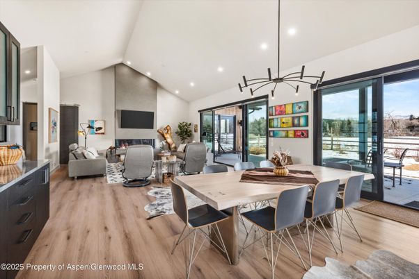 Dining room, Fireplace, Interior, Living room, Pendant Lights, Recessed Lighting, Wood Texture Flooring