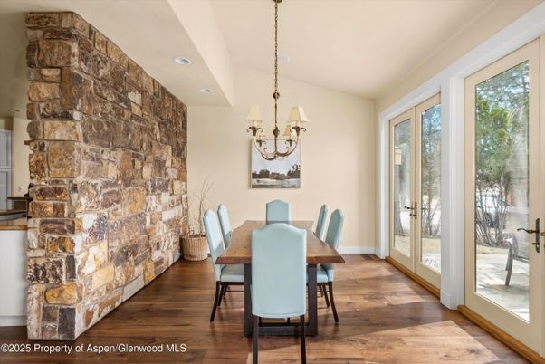 Chandelier, Dining room, Interior, Recessed Lighting, Stone Walls, Wood Texture Flooring