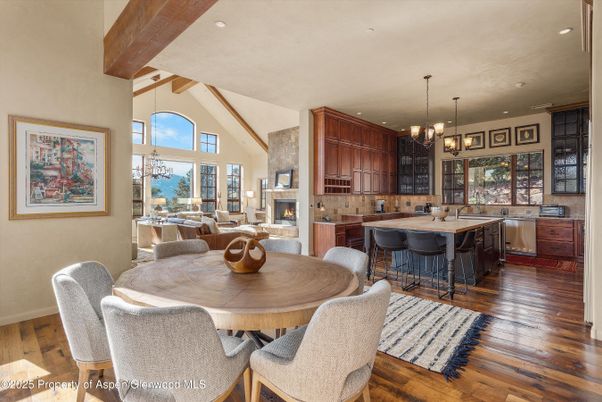 Chandelier, Dining room, Fireplace, Interior, Kitchen, Living room, Pendant Lights, Recessed Lighting, Wooden Beams, Wood Texture Flooring