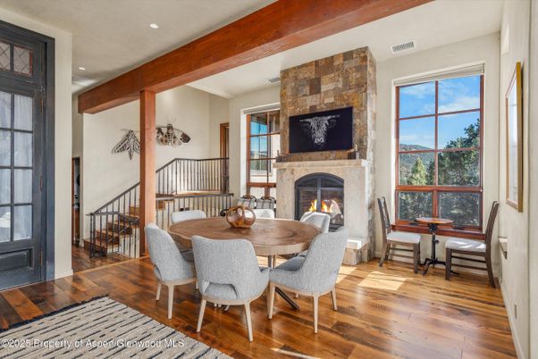 Dining room, Fireplace, Interior, Recessed Lighting, Stone Walls, Wooden Beams, Wood Texture Flooring