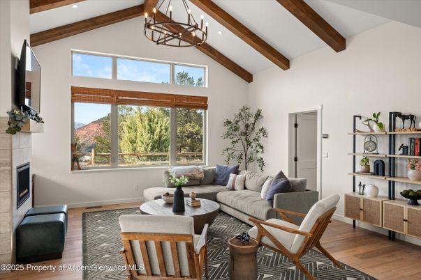 Fireplace, Interior, Living room, Pendant Lights, Recessed Lighting, Wooden Beams, Wood Texture Flooring