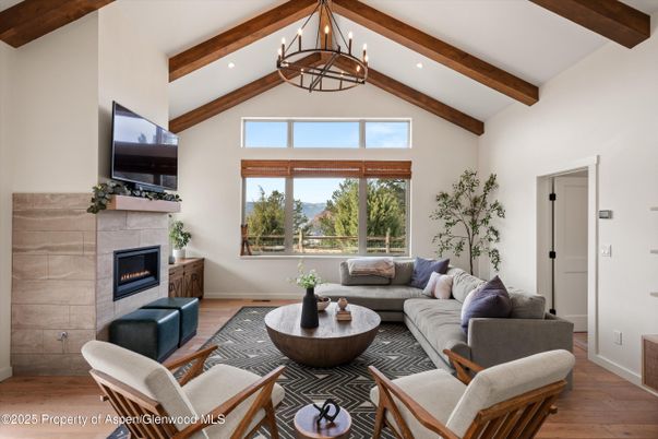 Chandelier, Fireplace, Interior, Living room, Recessed Lighting, Wooden Beams, Wood Texture Flooring