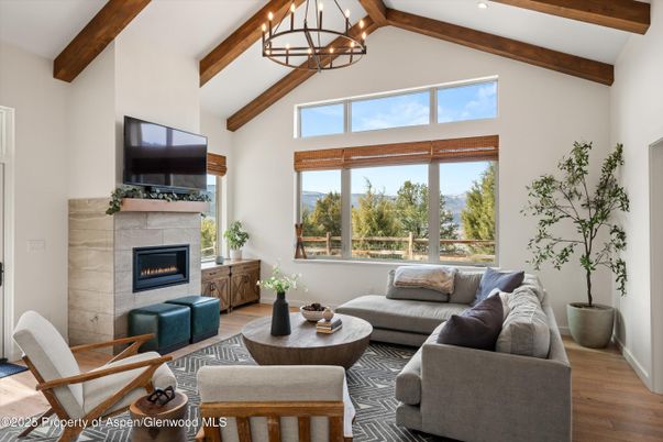 Chandelier, Fireplace, Interior, Living room, Wooden Beams, Wood Texture Flooring