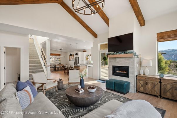 Dining room, Fireplace, Interior, Kitchen, Living room, Pendant Lights, Recessed Lighting, Stainless Steel Appliances, Wooden Beams, Wood Texture Flooring