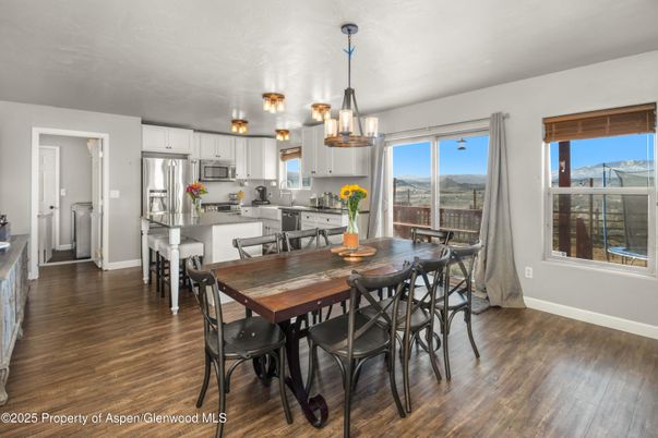 Dining room, Interior, Kitchen, Pendant Lights, Stainless Steel Appliances, Wood Texture Flooring