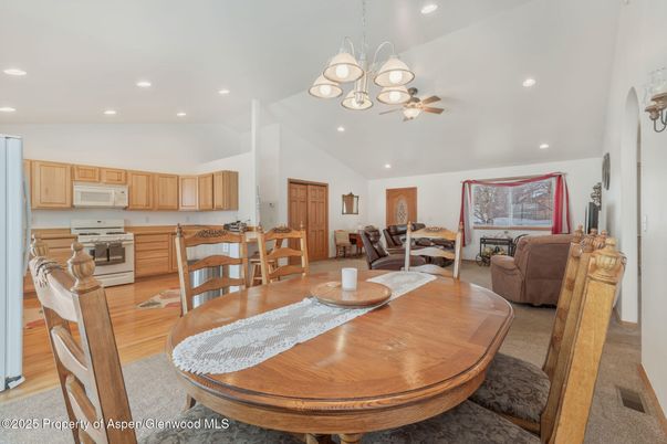 Dining room, Interior, Kitchen, Living room, Pendant Lights, Recessed Lighting, Stainless Steel Appliances, Wood Texture Flooring