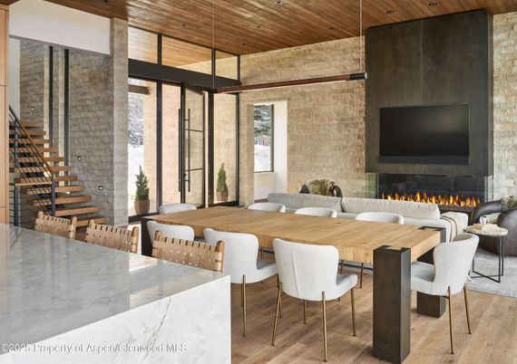 Dining room, Fireplace, Interior, Living room, Recessed Lighting, Stone Walls, Wooden Ceilings, Wood Texture Flooring
