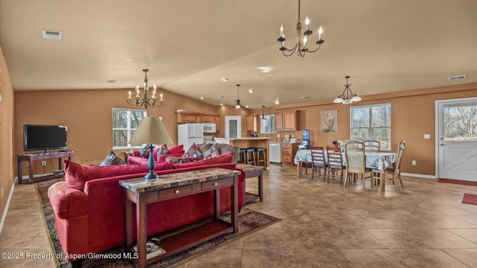 Chandelier, Dining room, Interior, Kitchen, Living room, Pendant Lights, Recessed Lighting, Stainless Steel Appliances